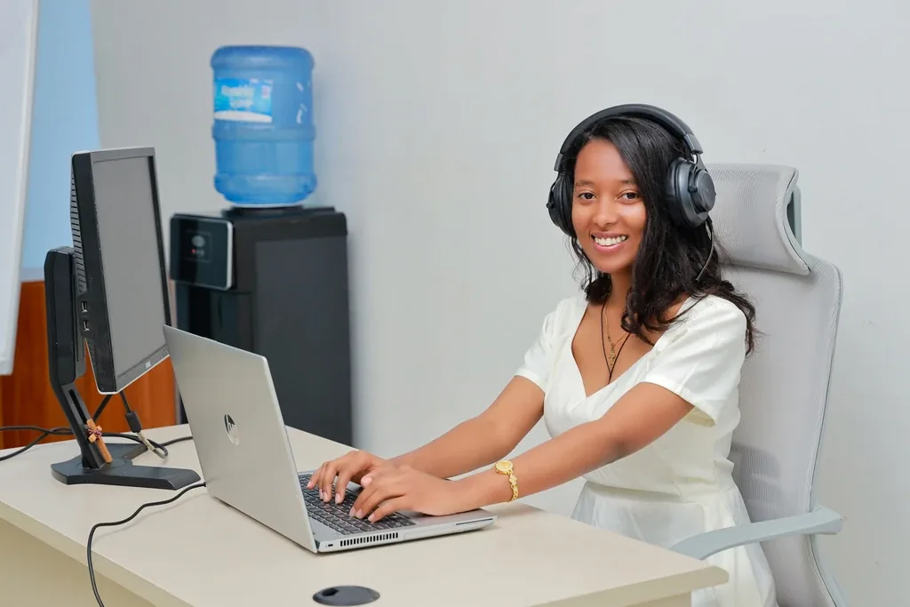 Remote team member working at a laptop